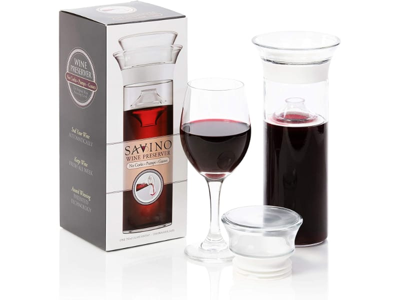 Savino wine preserver with a glass of red wine
