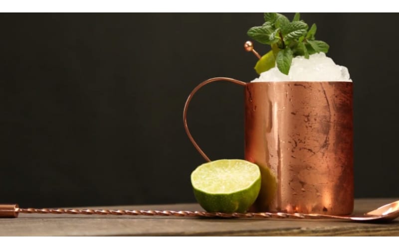 Skinny Mule served in a copper mug garnished with lime and mint