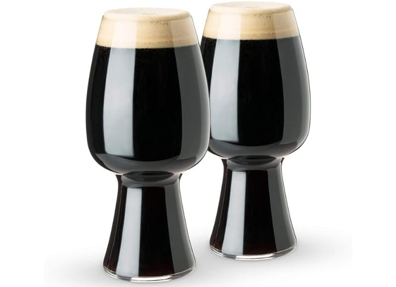 Two stout glasses filled with beer