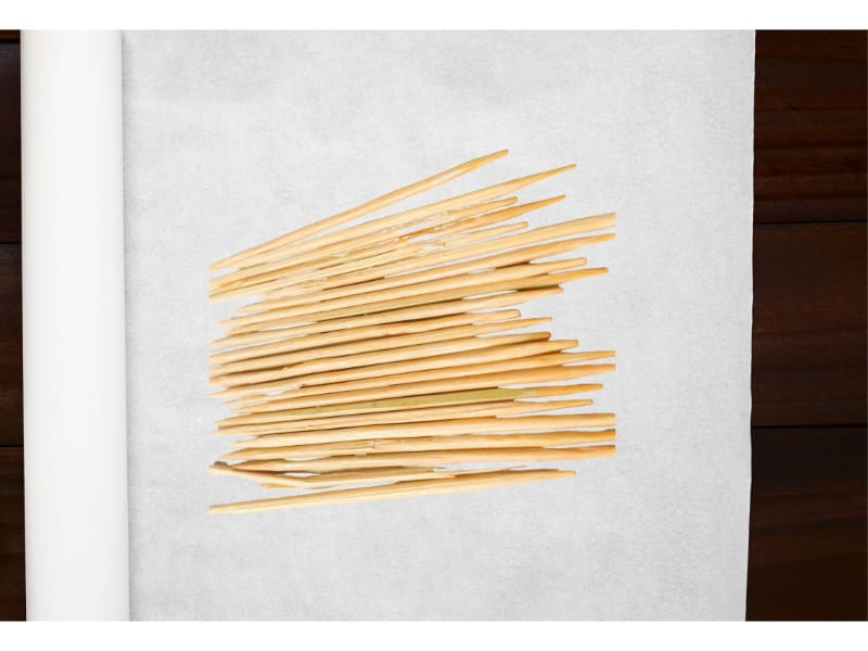 Toothpicks placed on a parchment paper - Image by wikihow.com