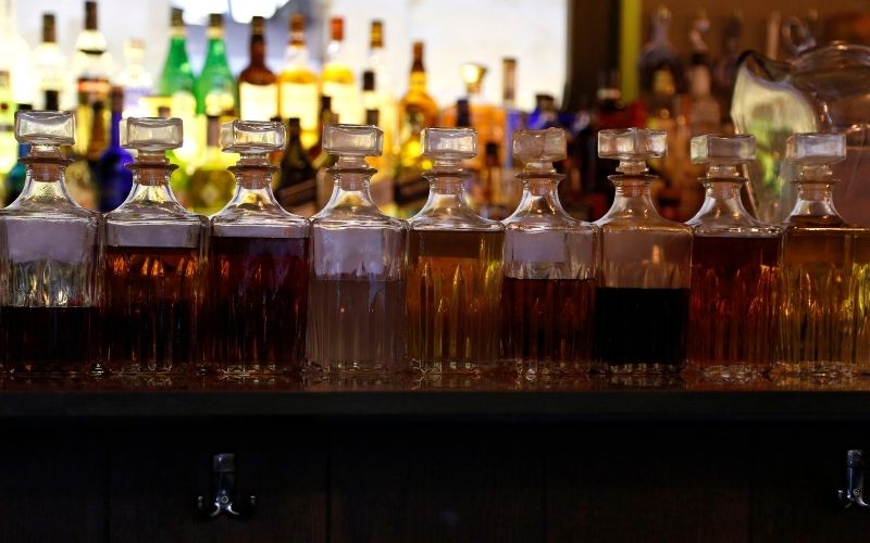 vintage alcoholic bottles in a bar