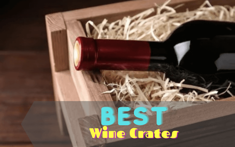 A wine crate with wine bottles and a glass of wine