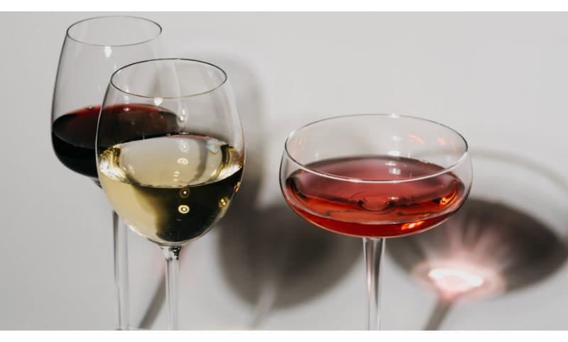 Red and White wines in a glass