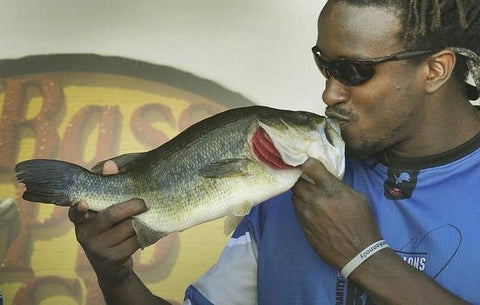 Willie Young Kissing a Bass