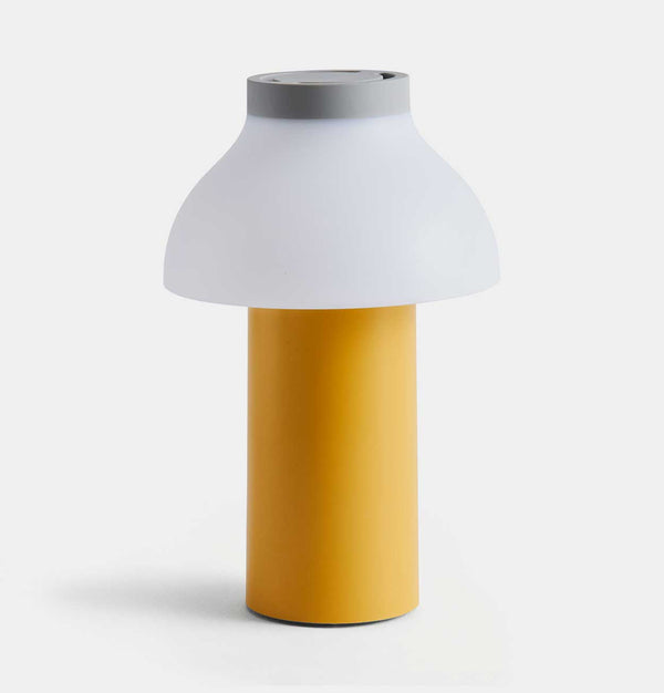 https://cdn.shopify.com/s/files/1/1217/7044/products/hay-pc-portable-lamp-soft-yellow-1_600x.jpg?v=1677177387