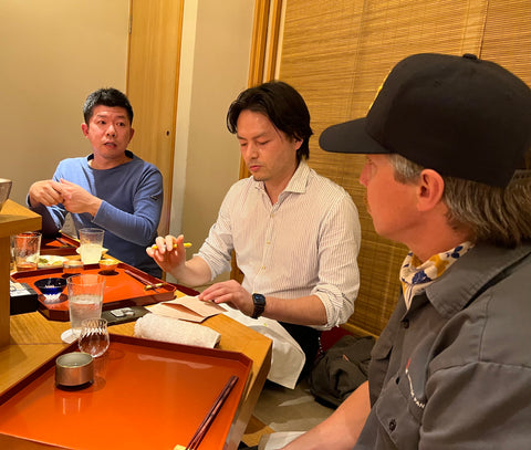 Doi-san giving a lesson about katsuobushi while Iio-san looks on