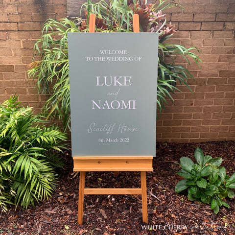 wedding welcome sign on an easel