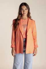 Woman wearing an orange blazer