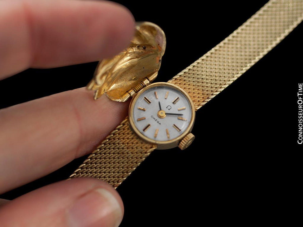 omega solid gold ladies watch