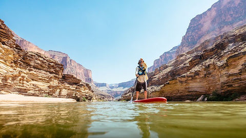 landscape shot of paddleboarding on the Colorado River