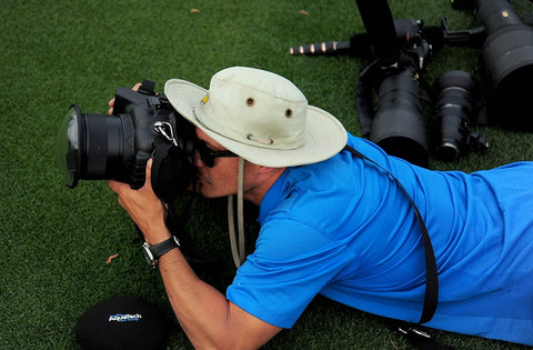 Robert Beck taking photos at the US Masters using AquaTech sound blimps