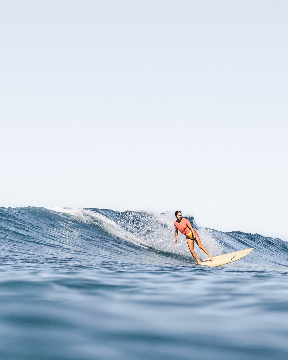 female longboarder cruising