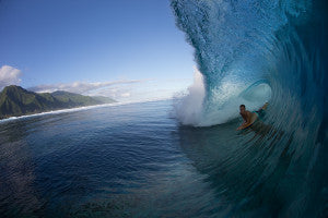 sponge boarder in a barrel in Tahiti