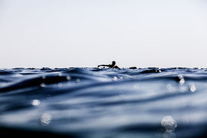 Picture of swimmer in surf