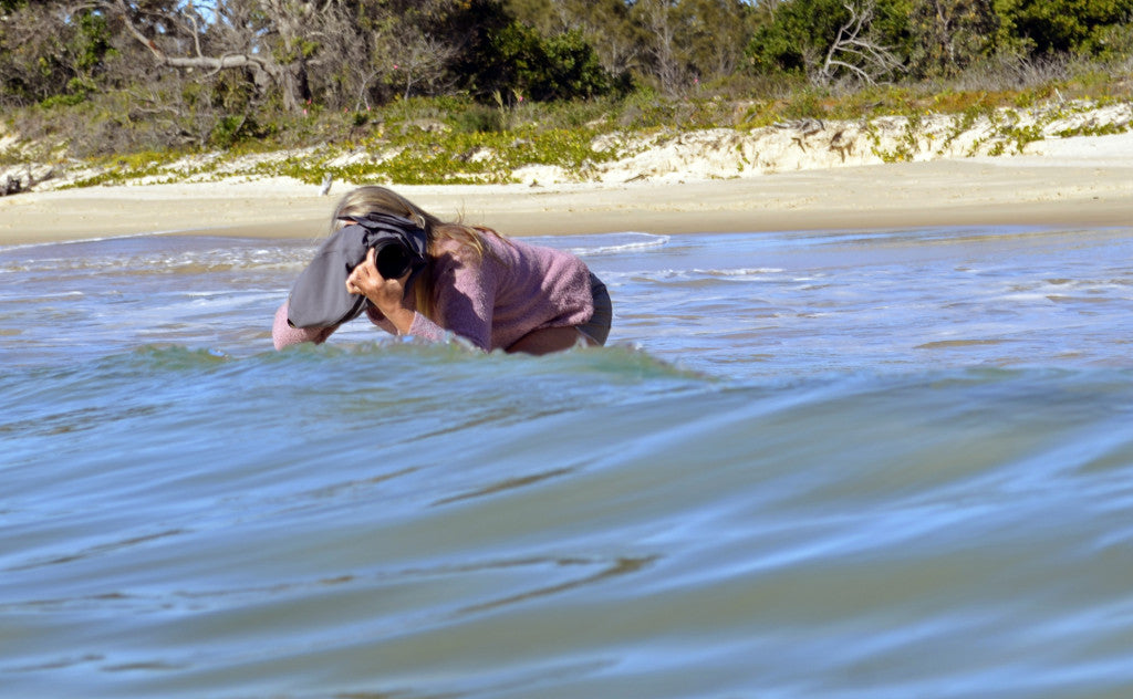Photographer Deb Morris with underwater camera case