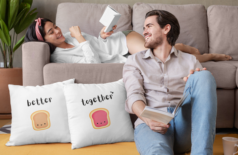 couple with customized pillows