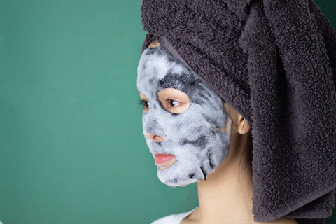 side view of woman face exfoliate her face with mask soap