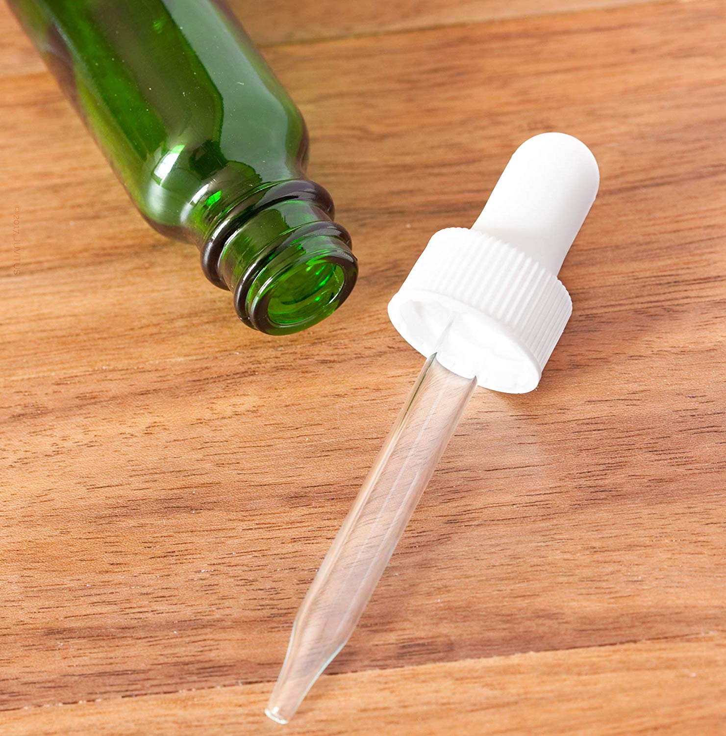 Download Green Glass Boston Round Dropper Bottle with White Top - .5 oz / 15 ml