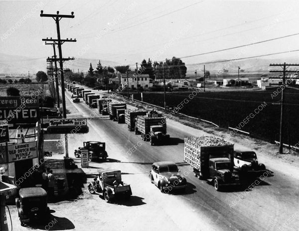 news photo trucks transport 1936 Salinas Valley fruit and produce to m ...