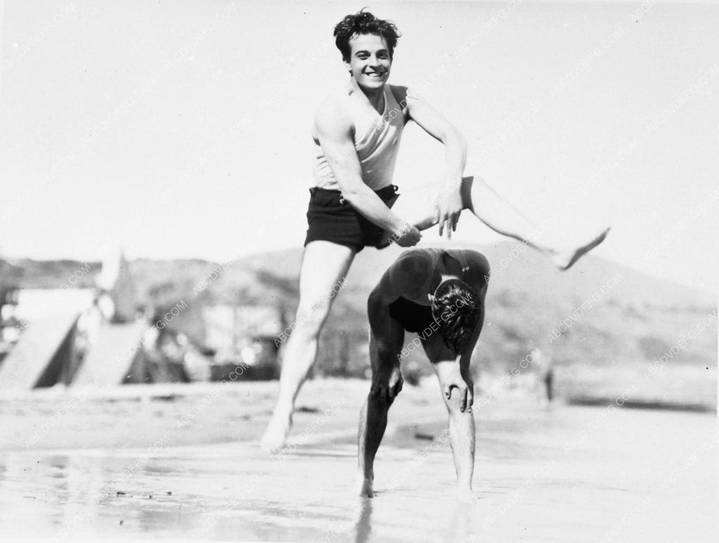 beefcake Ramon Novarro playing leap frog on the beach 6032-18 – ABCDVDVIDEO