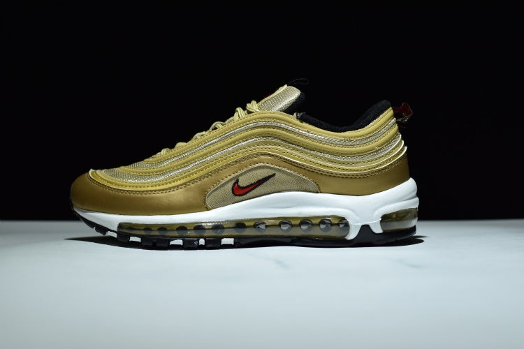 gold nike 97s