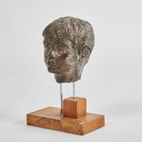 CARVED PLASTER BUST ON WALNUT STAND