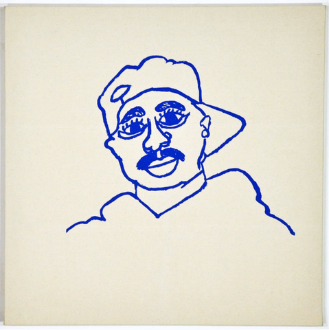 a print of Tupac Shakur in blue ink