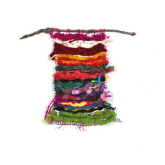 A weaving bound to a branch with magenta thread, with successive layers of yarn - in white, dark red, orange, twisted green, orange angora, pink pom poms, braided blue, and a snake-like green band trimmed with black-and-white-striped cord at the bottom.