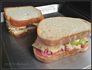 Reuben sandwiches going on the Little Griddle. 