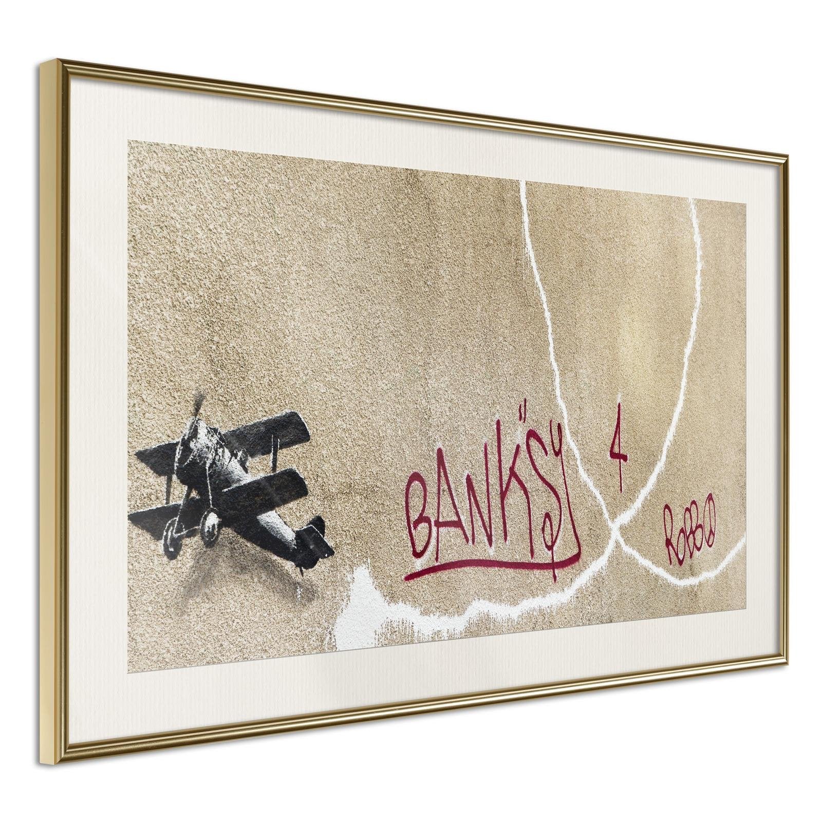 Läs mer om Inramad Poster / Tavla - Banksy: Love Plane - 60x40 Guldram med passepartout