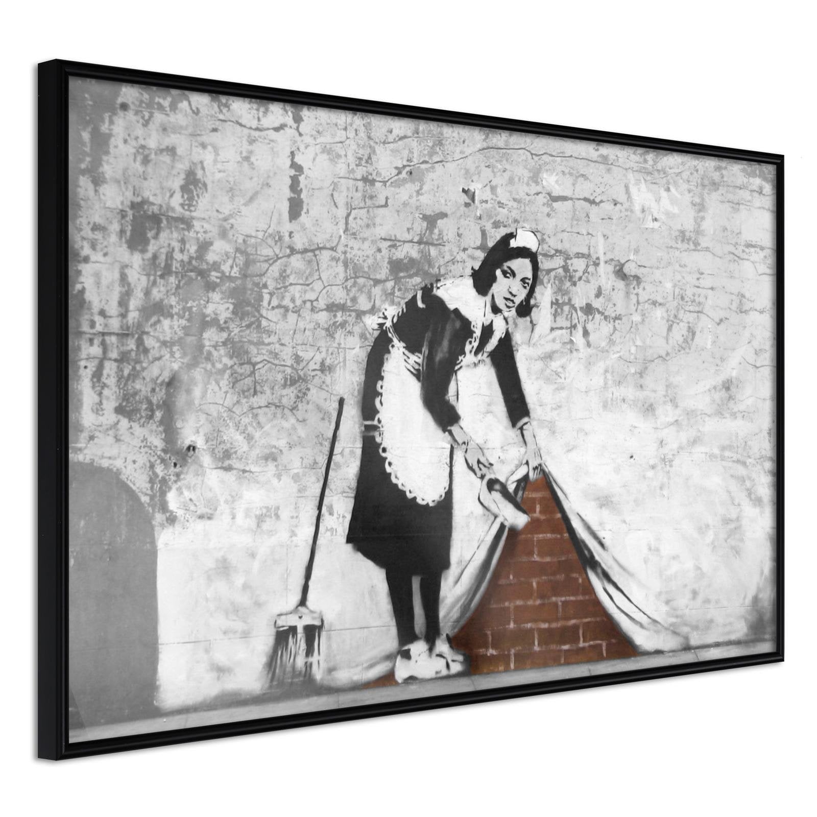 Inramad Poster / Tavla - Banksy: Sweep it Under the Carpet - 45x30 Svart ram