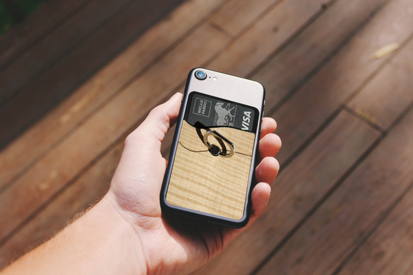 Wallet RNGR ring phone holder in wood on iPhone