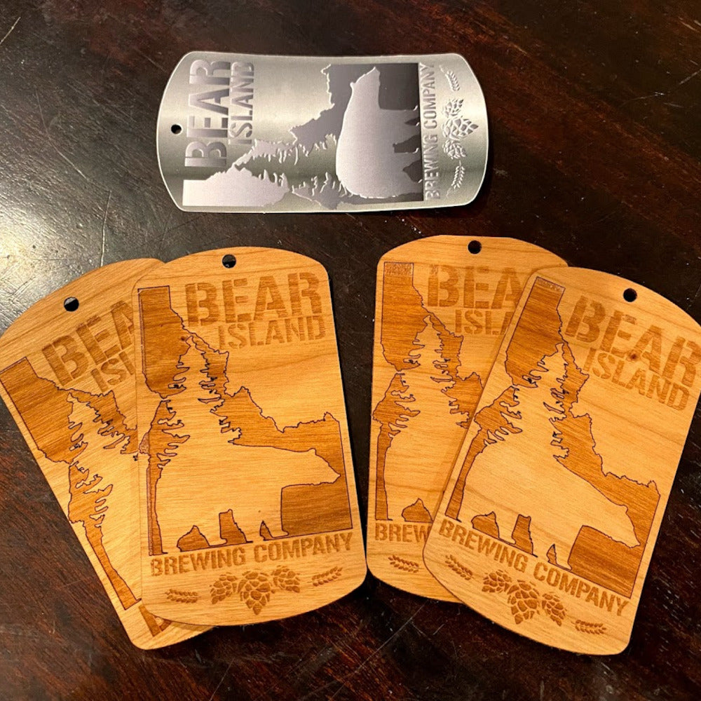 Custom logo stickers for Bear Island Brewing, laser-engraved in American Cherry