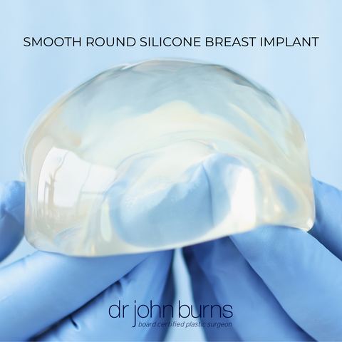 Smooth surface texture breast implants