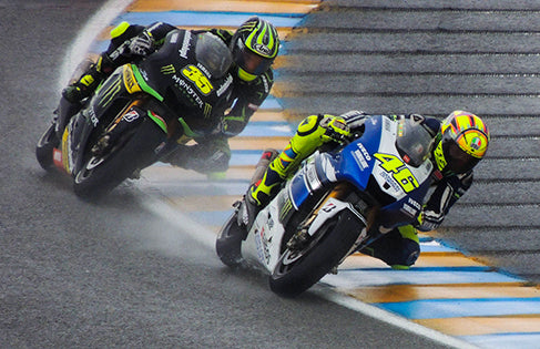 Rossi with Cal Crutchlow at the 2013 French Grand Prix, where he finished 12th