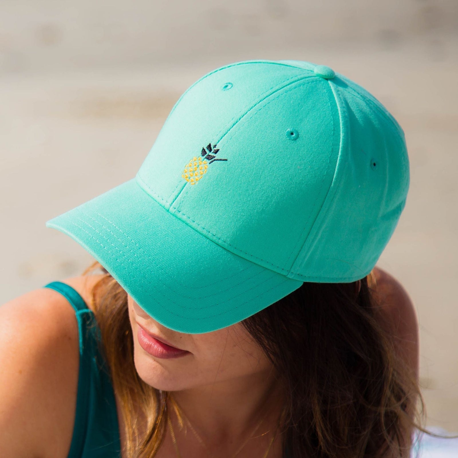 https://cdn.shopify.com/s/files/1/1223/9006/products/cheers-beaches-accessories-universal-seafoam-cheers-beaches-embroidered-pineapple-hat-seafoam-30977892483151_1600x.jpg?v=1658776554