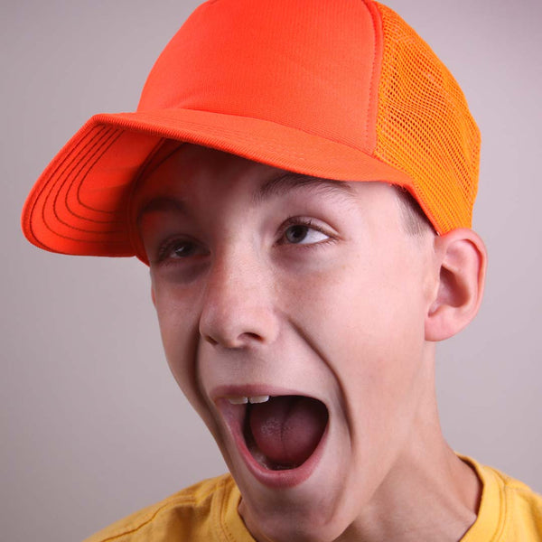 kid in a silly orange hat