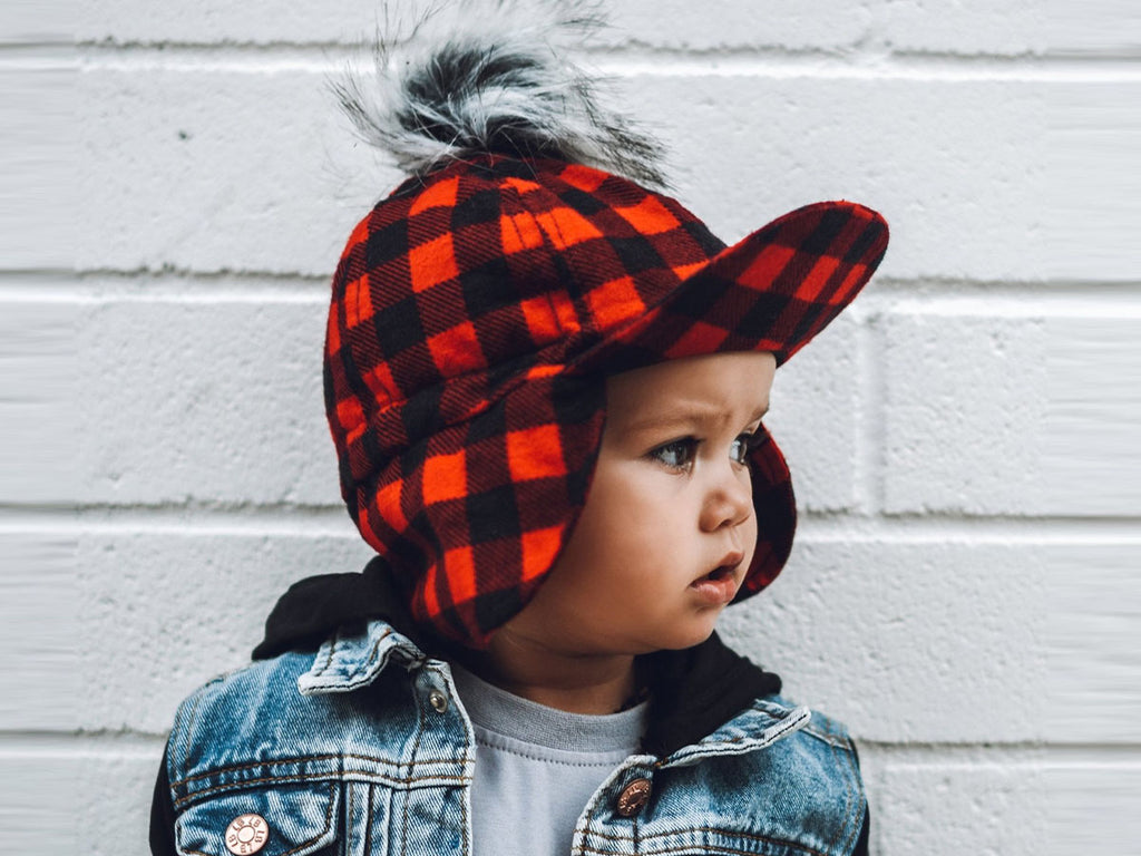 buffalo plaid flannel hat with faux fur pom on toddler