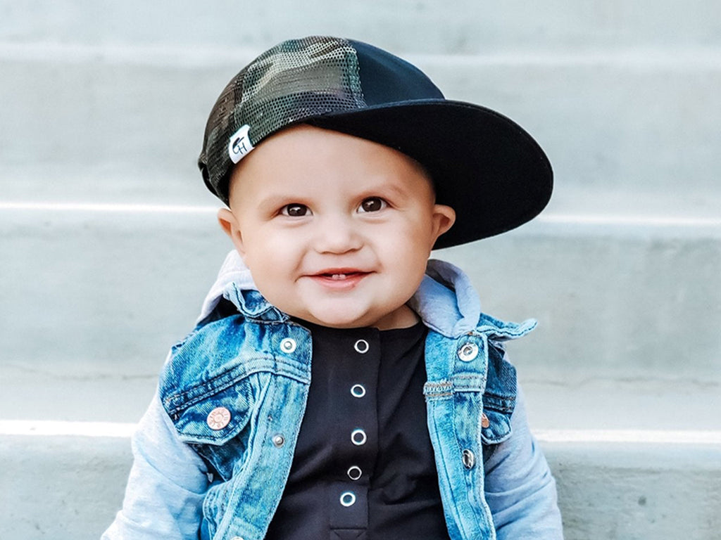 Child wearing our Black Camo Mesh Trucker Hat