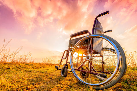 wheelchair in sunset