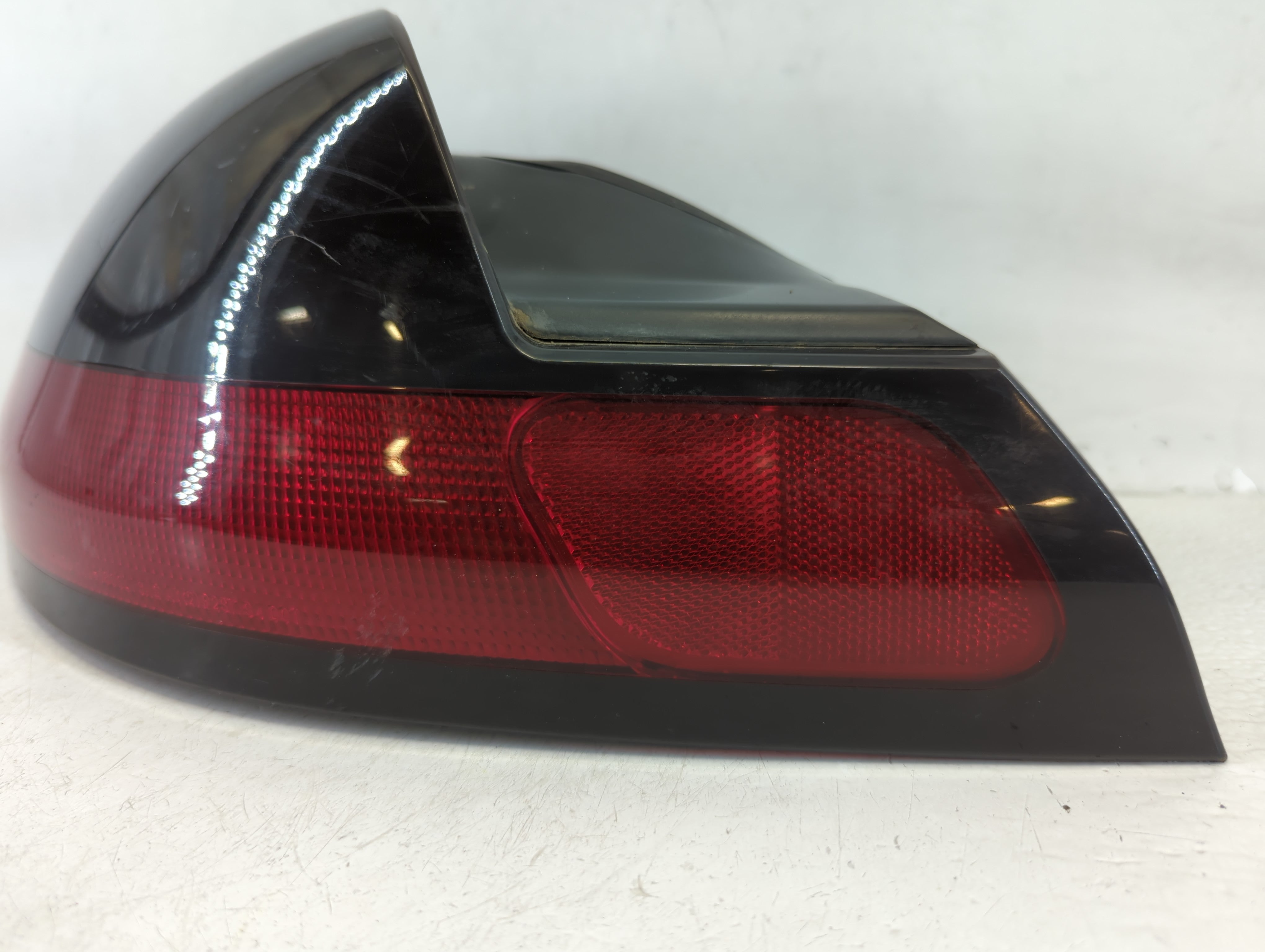 1997-2000 Dodge Avenger Tail Light Assembly Driver Left OEM P/N:168 2057 Fits Fits 1997 1998 1999 2000 OEM Used Auto Parts - Oemusedautoparts1.com