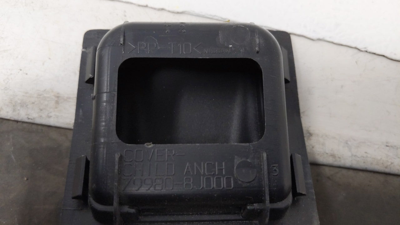 2004 Nissan Maxima Child Seatbelt Anchor Cover 79980-8J000 - Oemusedautoparts1.com