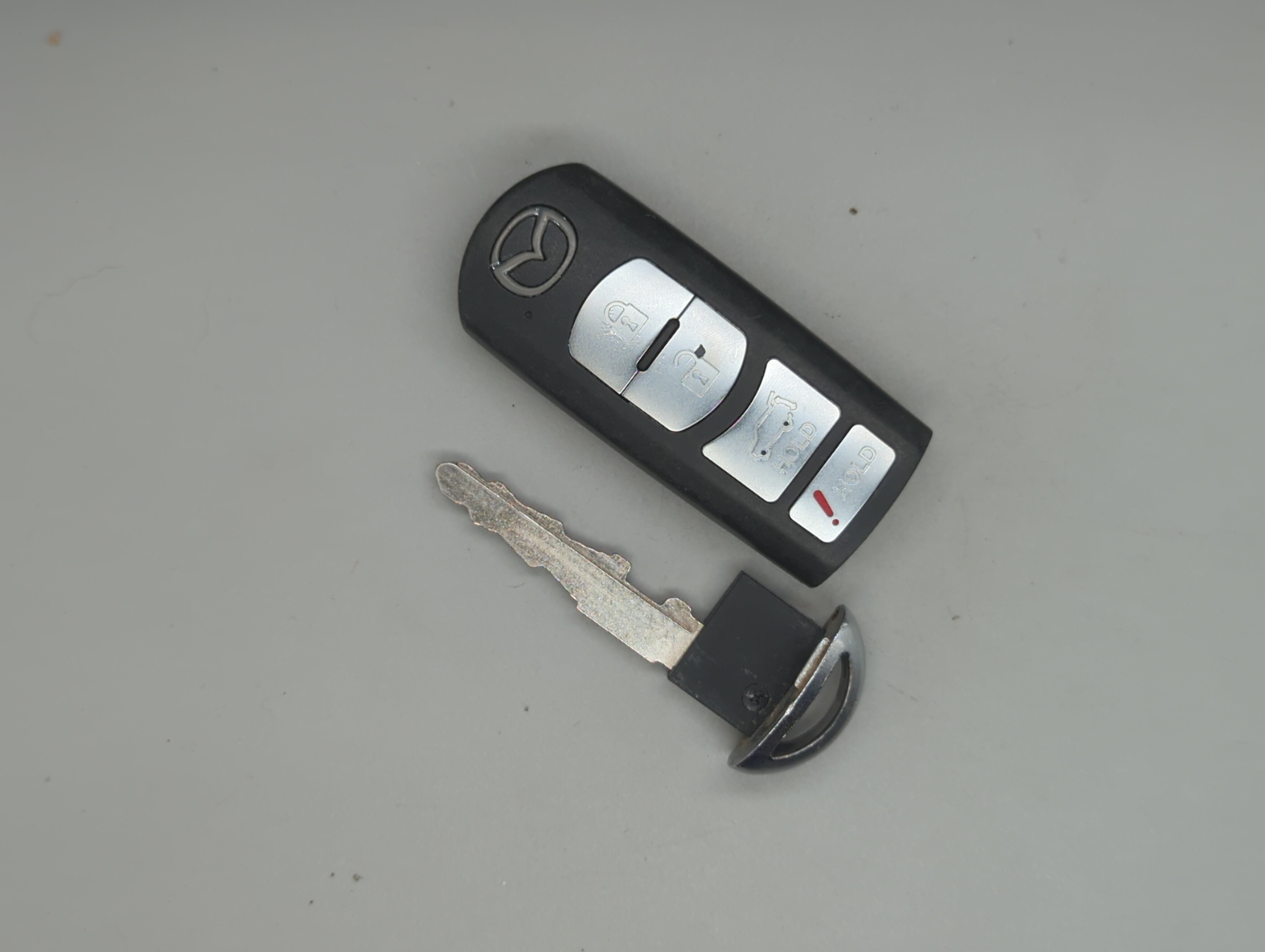 Mazda Cx-9 Keyless Entry Remote Fob Wazx1t763ske11a04 4 Buttons - Oemusedautoparts1.com