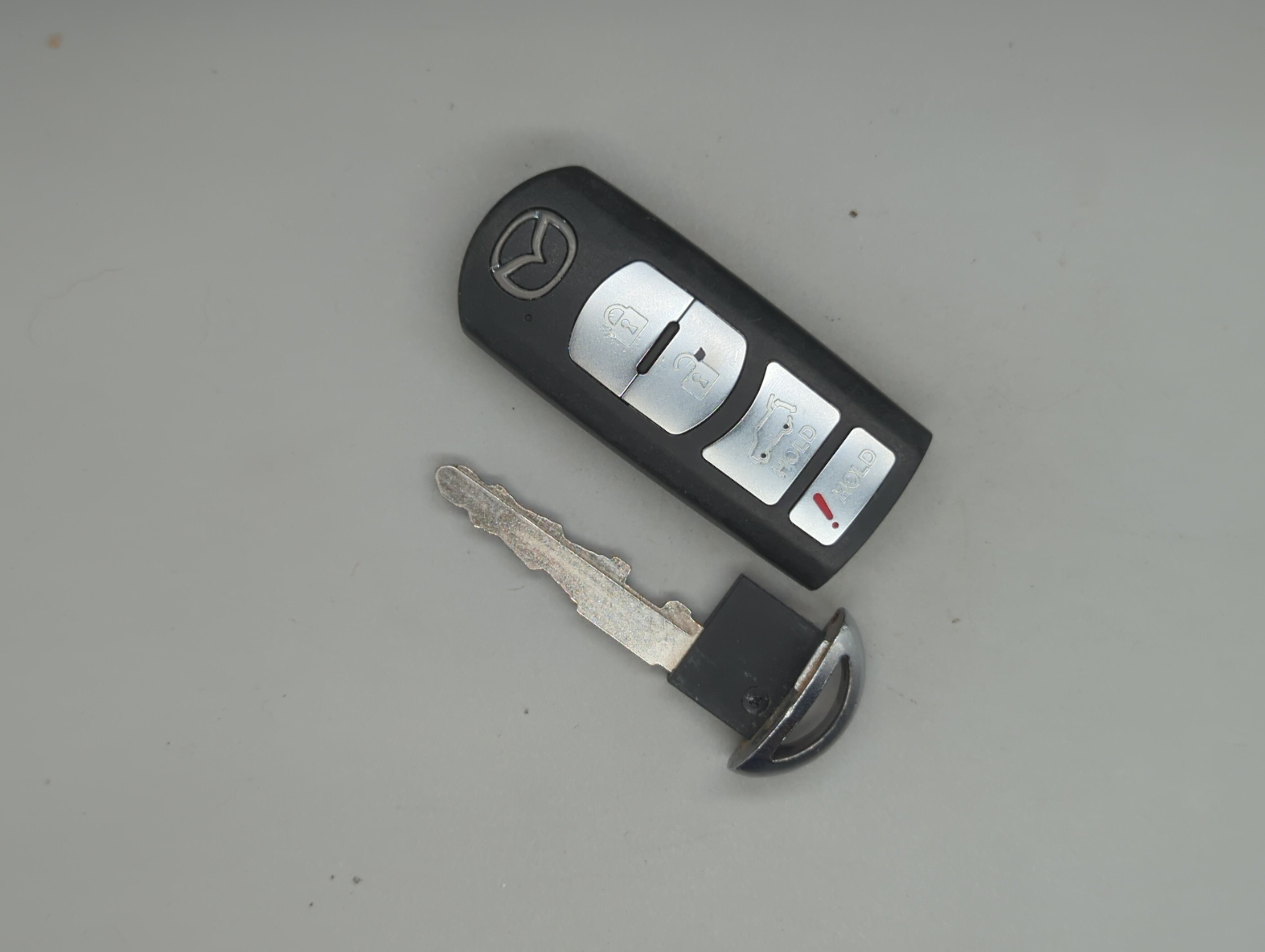 Mazda Cx-9 Keyless Entry Remote Fob Wazx1t763ske11a04 4 Buttons - Oemusedautoparts1.com