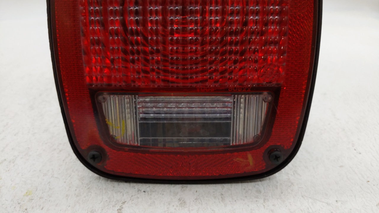 1998-2006 Jeep Wrangler Tail Light Assembly Passenger Right OEM Fits 1998 1999 2000 2001 2002 2003 2004 2005 2006 OEM Used Auto Parts - Oemusedautoparts1.com