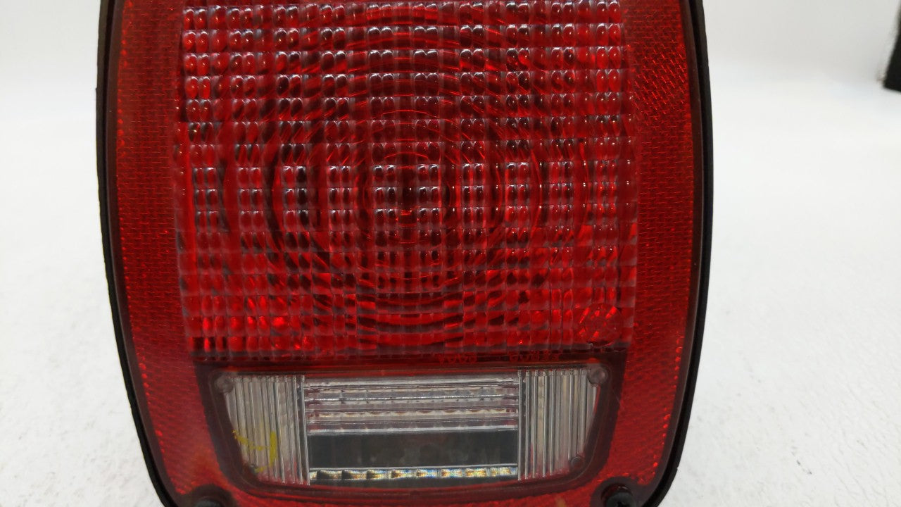 1998-2006 Jeep Wrangler Tail Light Assembly Passenger Right OEM Fits 1998 1999 2000 2001 2002 2003 2004 2005 2006 OEM Used Auto Parts - Oemusedautoparts1.com