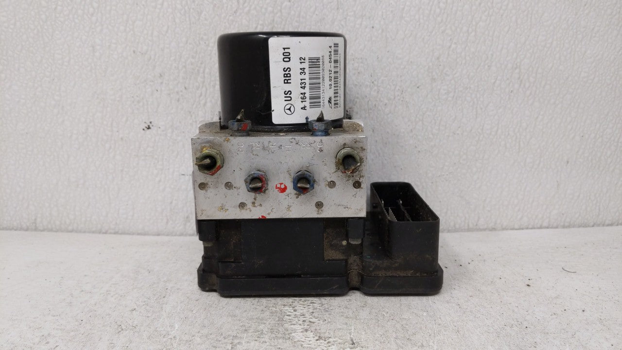 2010-2011 Mercedes-Benz Ml450 ABS Pump Control Module Replacement P/N:A 164 431 34 12 1644313412 Fits 2010 2011 OEM Used Auto Parts - Oemusedautoparts1.com