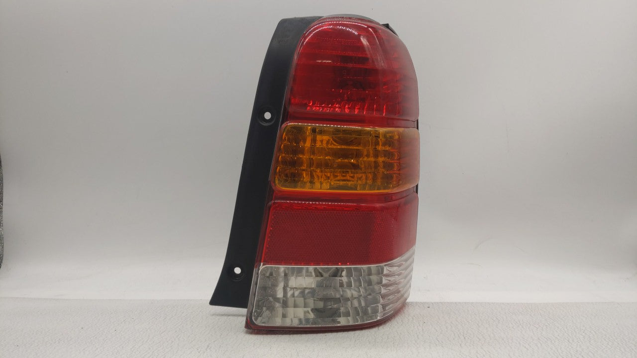 2001-2007 Ford Escape Tail Light Assembly Passenger Right OEM P/N:4L84-13B504-D Fits 2001 2002 2003 2004 2005 2006 2007 OEM Used Auto Parts - Oemusedautoparts1.com