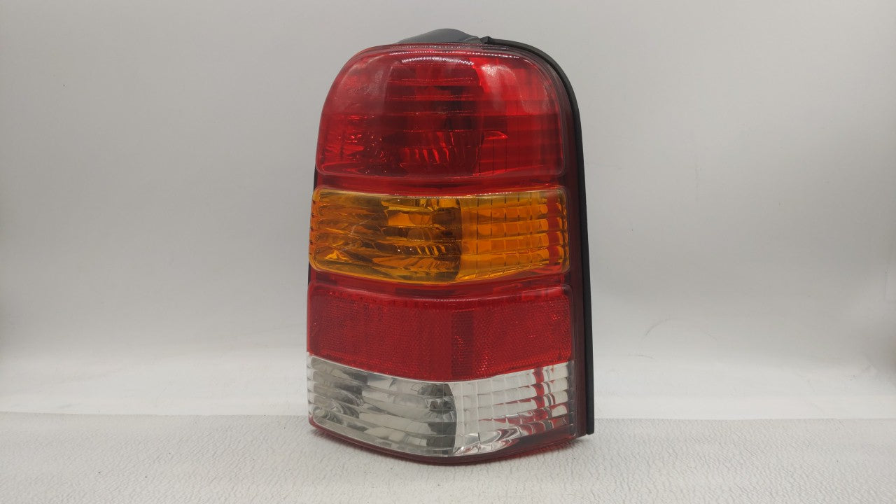 2001-2007 Ford Escape Tail Light Assembly Passenger Right OEM P/N:4L84-13B504-D Fits 2001 2002 2003 2004 2005 2006 2007 OEM Used Auto Parts - Oemusedautoparts1.com