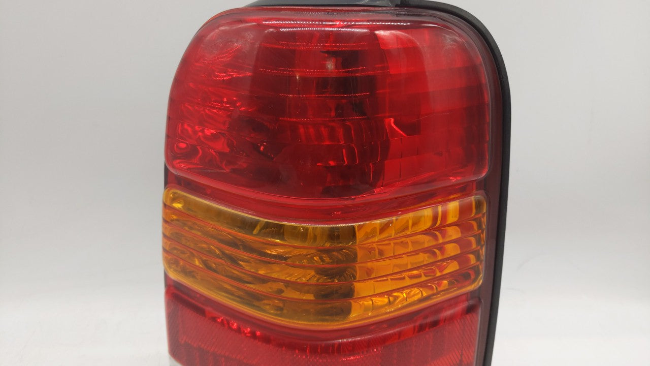 2001-2007 Ford Escape Tail Light Assembly Passenger Right OEM P/N:4L84-13B504-D Fits 2001 2002 2003 2004 2005 2006 2007 OEM Used Auto Parts - Oemusedautoparts1.com